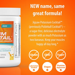 Vaso con bebida naranja Jigsaw Health Potassium Cocktail listo para beber, hidratación sabrosa sin azúcar