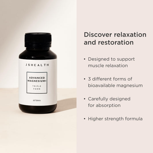 JSHealth Magnesio Avanzado: tabletas en mano para apoyo diario de nervios y músculos.