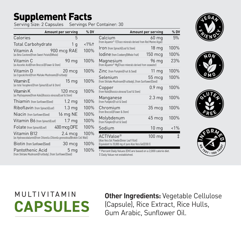 Kaged multivitamin en mesa con alimentos saludables sugiere integración dietaria