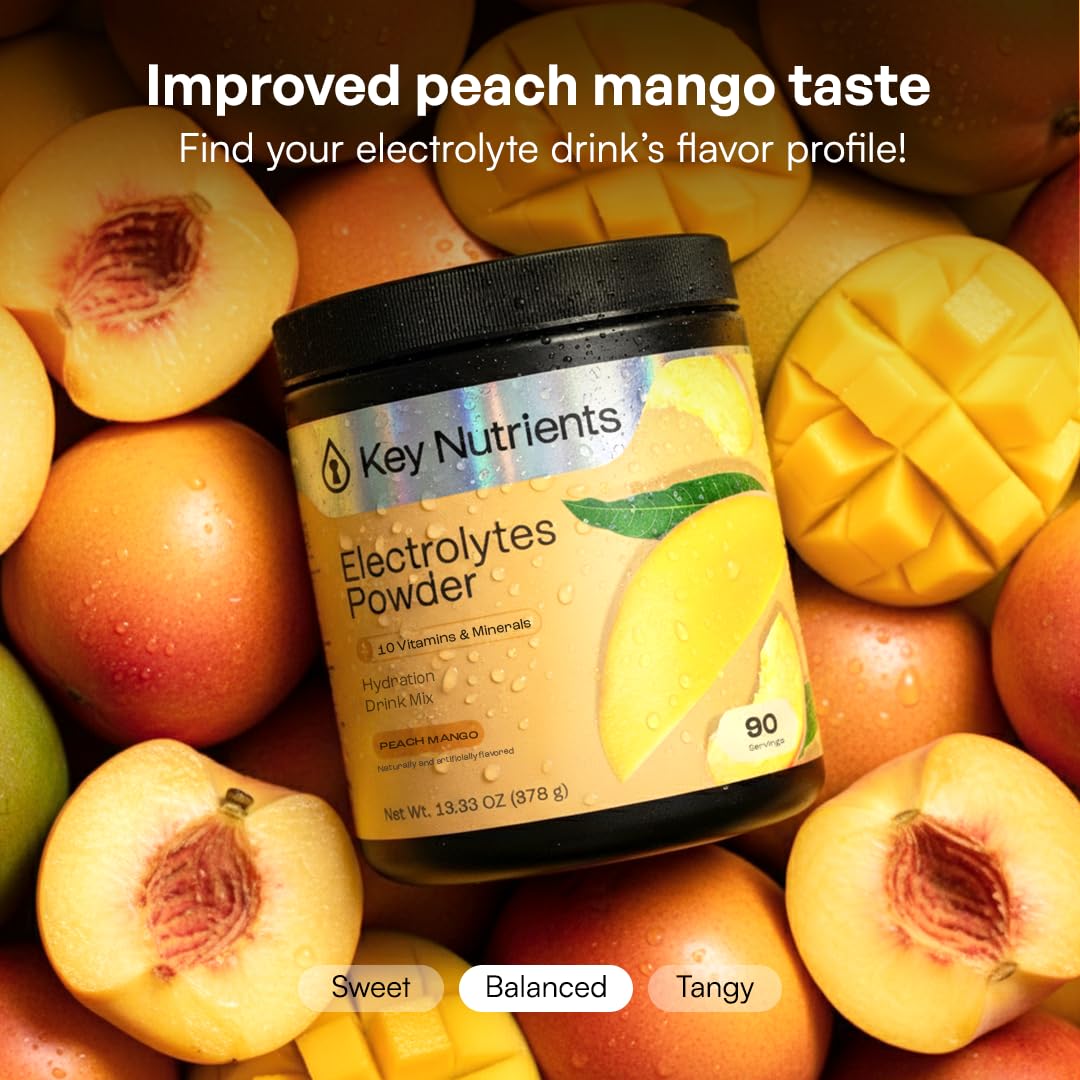 KEY NUTRIENTS vaso con bebida peach mango listo para beber y refrescar después de ejercicio