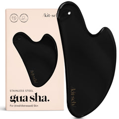 Kitsch gua sha acero frontal mostrando diseño ergonómico y acabado mate para control