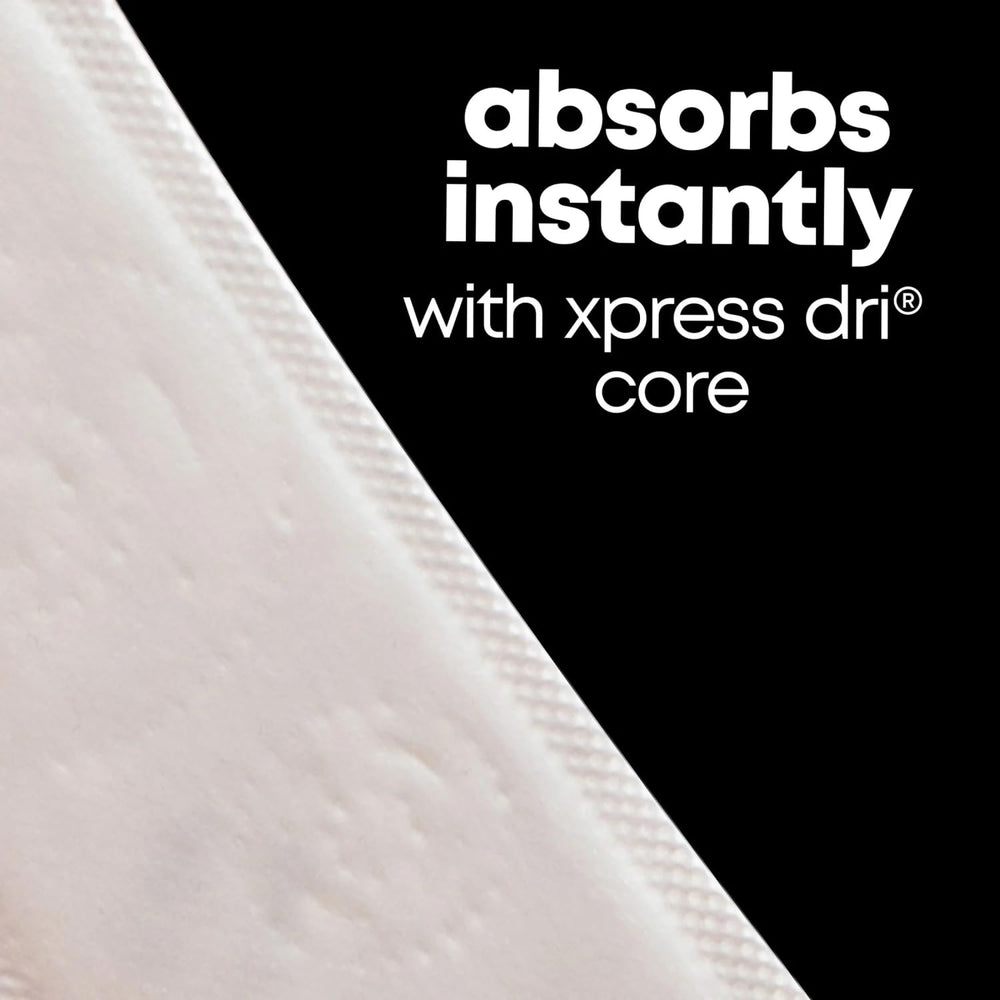 Kotex protector junto a regla para comparar tamaño y usar como referencia práctica