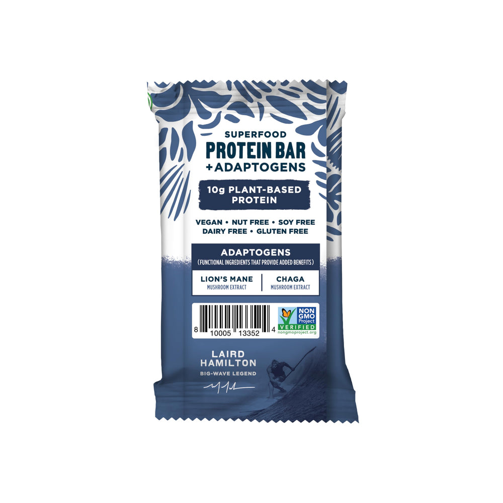 Detalle de la textura de la barrita Laird Superfood resaltando semillas y trozos visibles, aporta nutrición real