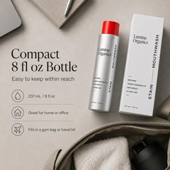 Comparación de tamaño de Lumine Organics Mouthwash en mano para mostrar su formato 237 ml