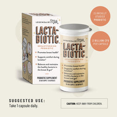 Frasco de Legendairy Milk Lacta-Biotic en encimera junto a un biberón, contexto doméstico maternal