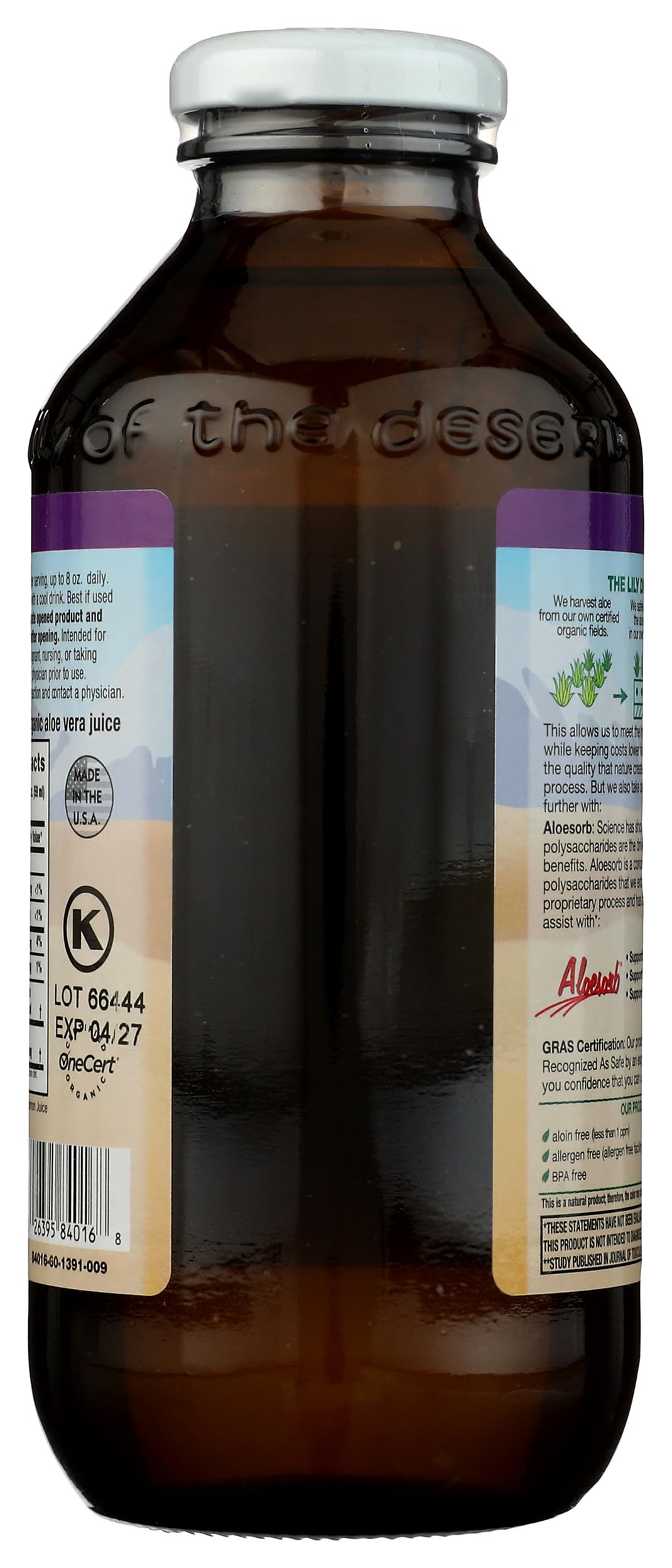 Lily Of The Desert botella abierta junto a un vaso para servir dosis recomendada