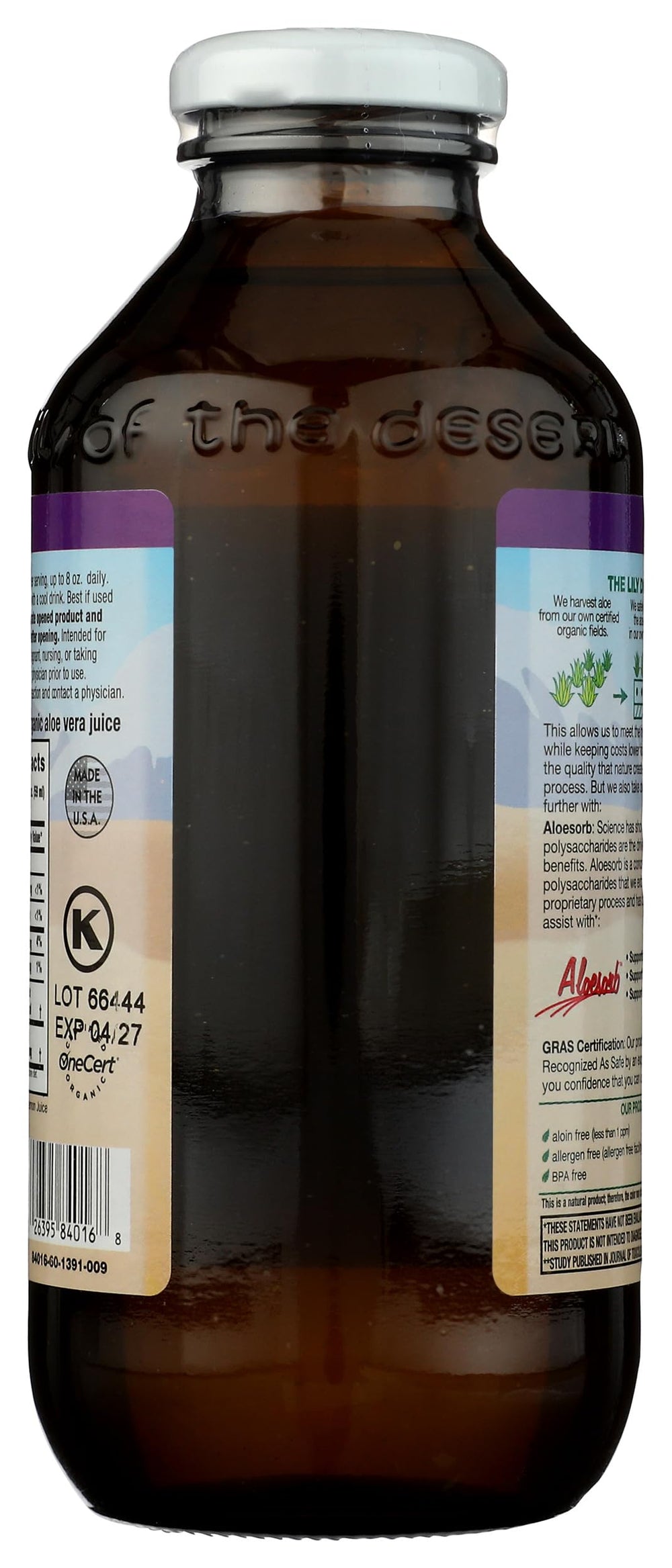 Lily Of The Desert botella abierta junto a un vaso para servir dosis recomendada