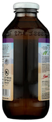Lily Of The Desert botella abierta junto a un vaso para servir dosis recomendada
