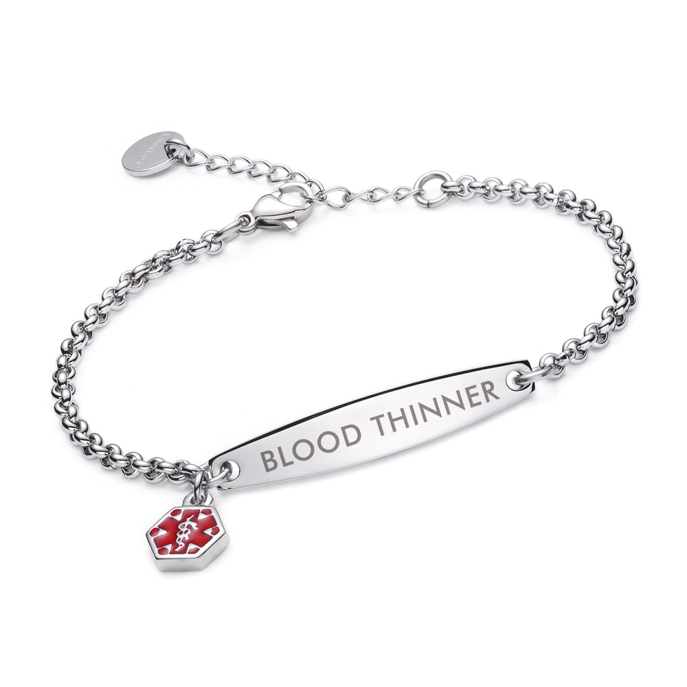LinnaLove placa frontal visible con grabado BLOOD THINNER, alerta clara