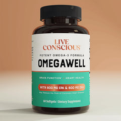 Live Conscious cápsulas en mano mostrando el tamaño fácil de tragar y conveniencia