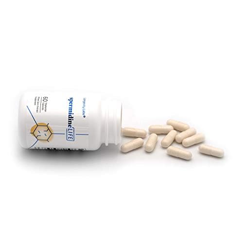 LONGEVITY LABS cápsula en mano para comparar tamaño y dosificación