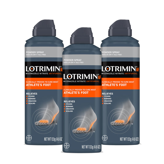 Lotrimin spray frente del empaque mostrando lata y beneficio de alivio rápido