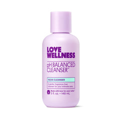Love Wellness frasco frente mostrando etiqueta clara y beneficio de higiene suave