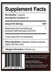MAÏA SUPERFOODS cápsula en mano para comparar escala y dosis visualmente