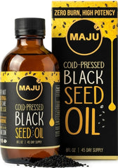 Maju botella frontal de aceite de comino negro, presentación limpia y vidrio