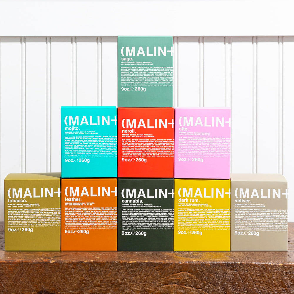 MALIN+GOETZ vela bergamot empaque mostrando 'hand poured' Brooklyn, calidad artesanal