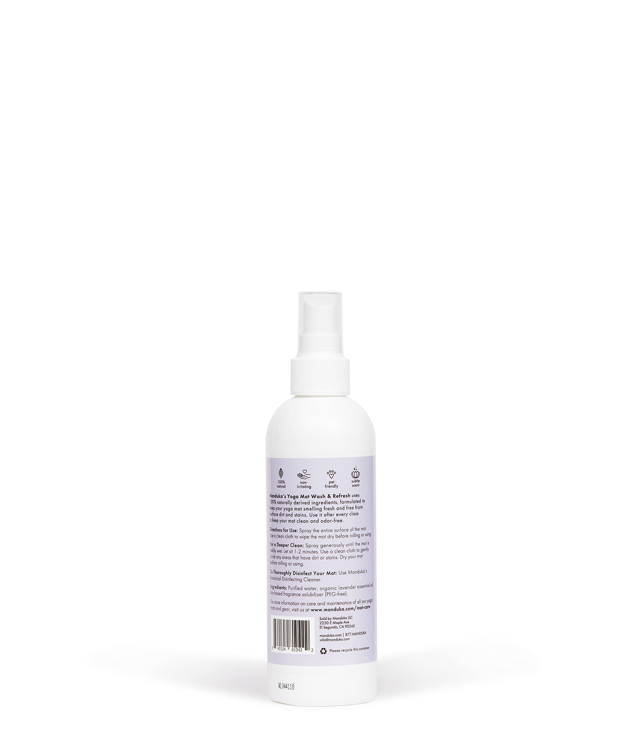 Manduka spray en uso sobre esterilla, fácil aplicación y refresco inmediato