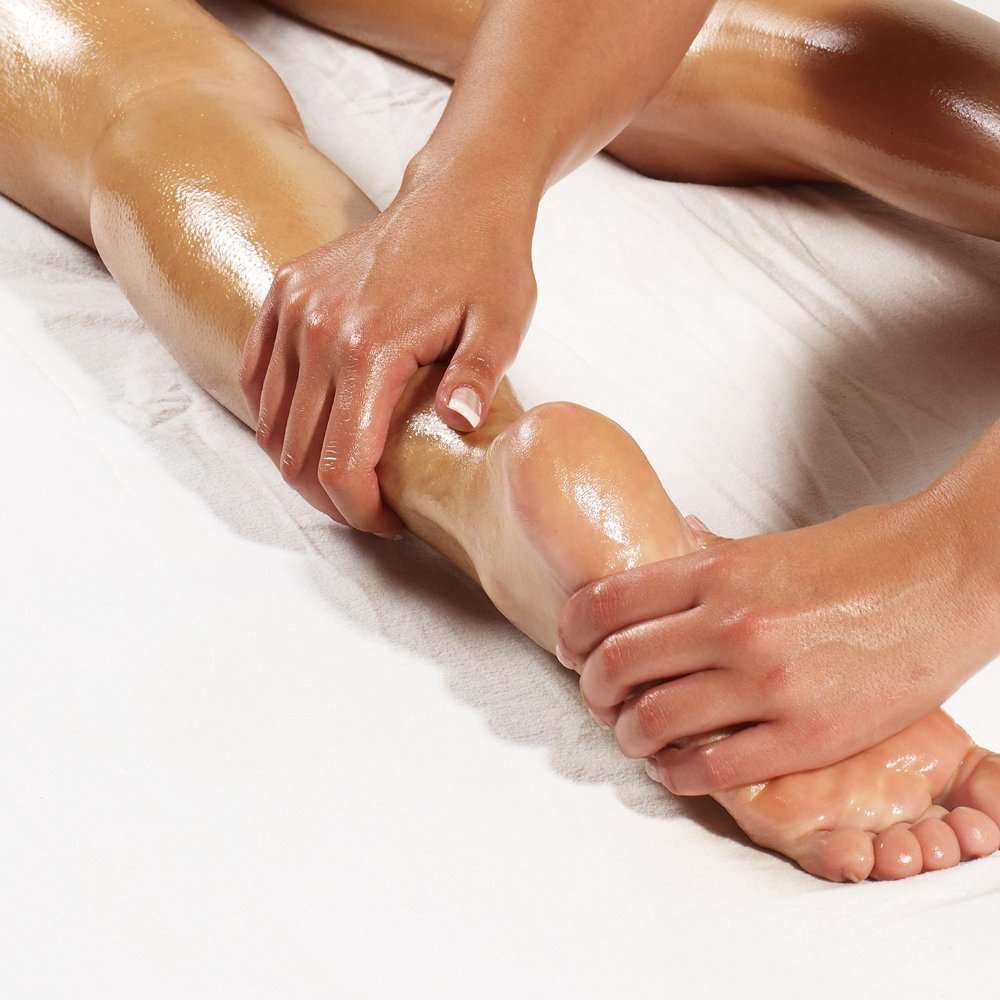 Master Massage frasco junto a mano para comparar tamaño y cantidad ideal profesional