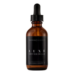 Mavwicks frasco frontal mostrando diseño elegante y beneficio de lujo aromático
