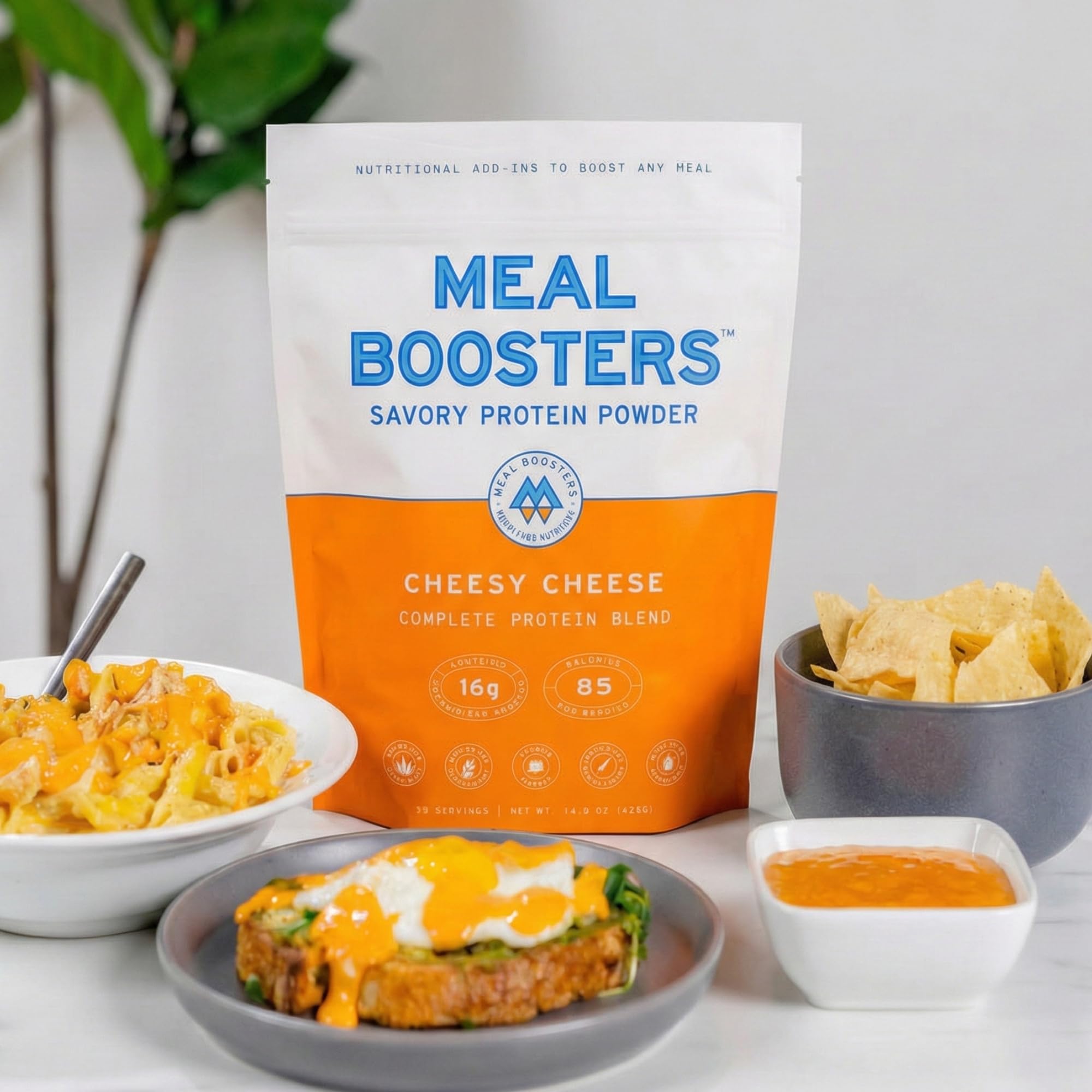 Meal Boosters frente del envase Cheesy Cheese mostrando la presentación y beneficio proteico