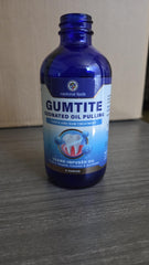MEDICINAL FOODS Gumtite junto a un objeto para comparar tamaño y dosificación