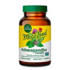 MegaFood frasco frente mostrando etiqueta y beneficios visibles