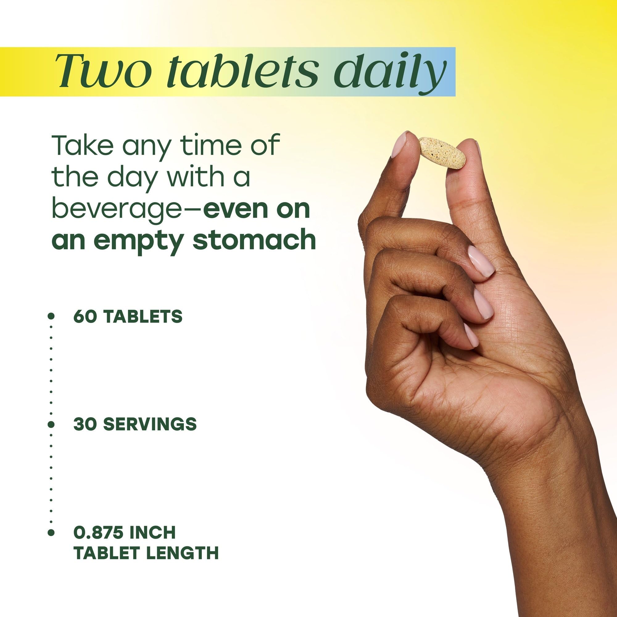MegaFood comparación de tamaño de tabletas junto a moneda para escala