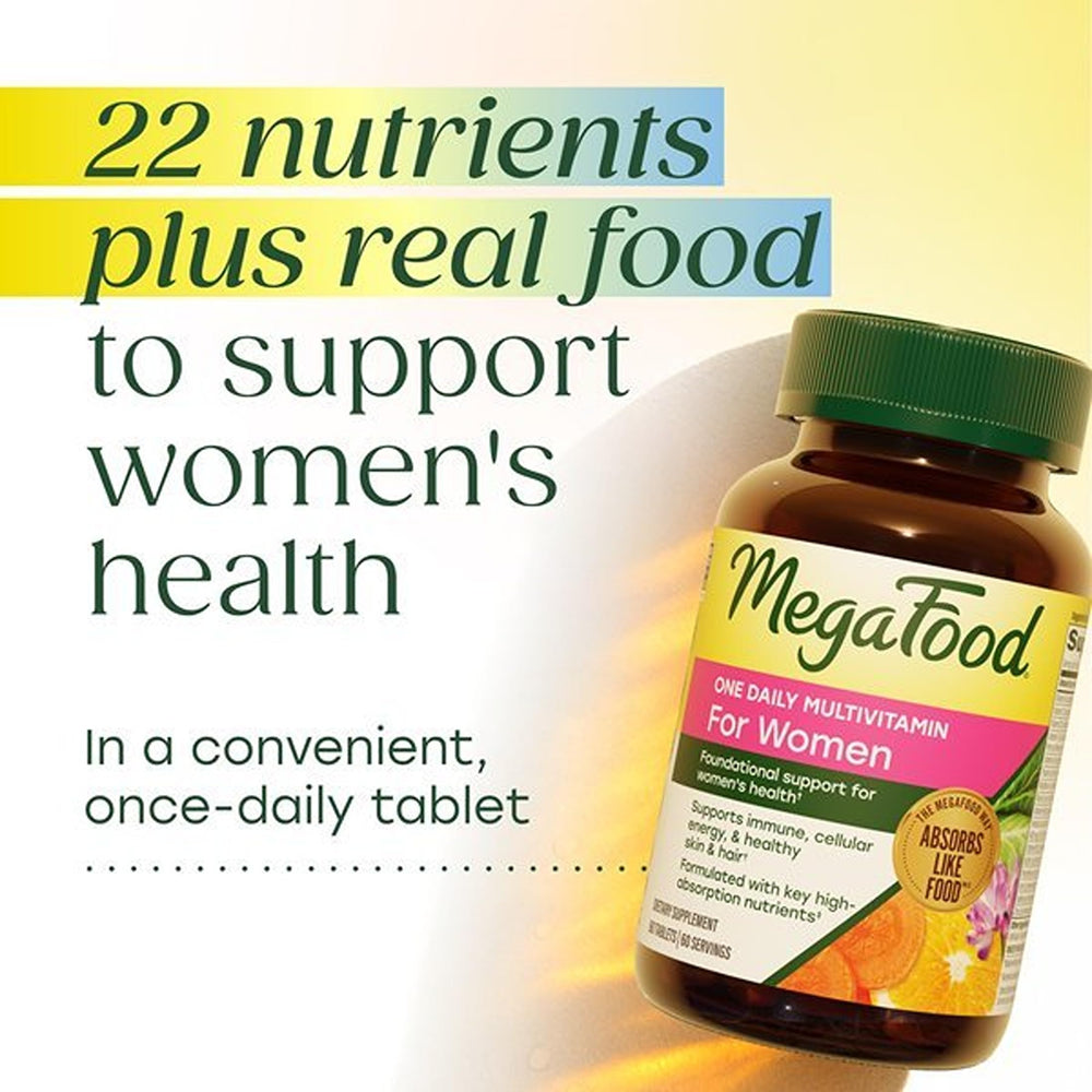 MegaFood tableta en mano mostrando tamaño y dosis práctica