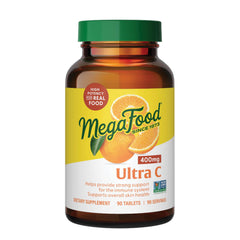 MegaFood envase frontal mostrando 90 tabletas y beneficios principales