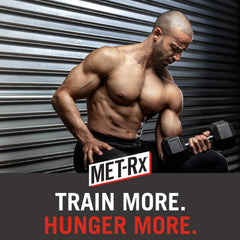 MET-Rx barra junto a una manzana para comparar tamaño y porción