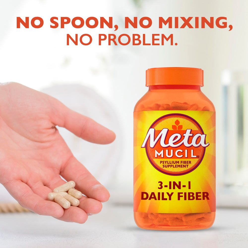 Metamucil cápsulas en mano para tomar, conveniencia diaria