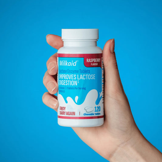 Milkaid detalle de tabletas masticables para fácil disolución y sabor