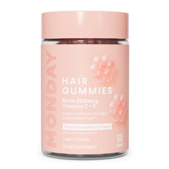 MONDAY HAIRCARE envase frontal que muestra 60 gomitas y beneficios veganos