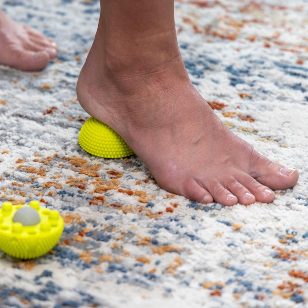 NABOSO Neuro Ball usada bajo los pies en una sesión, facilita movilidad y recuperación