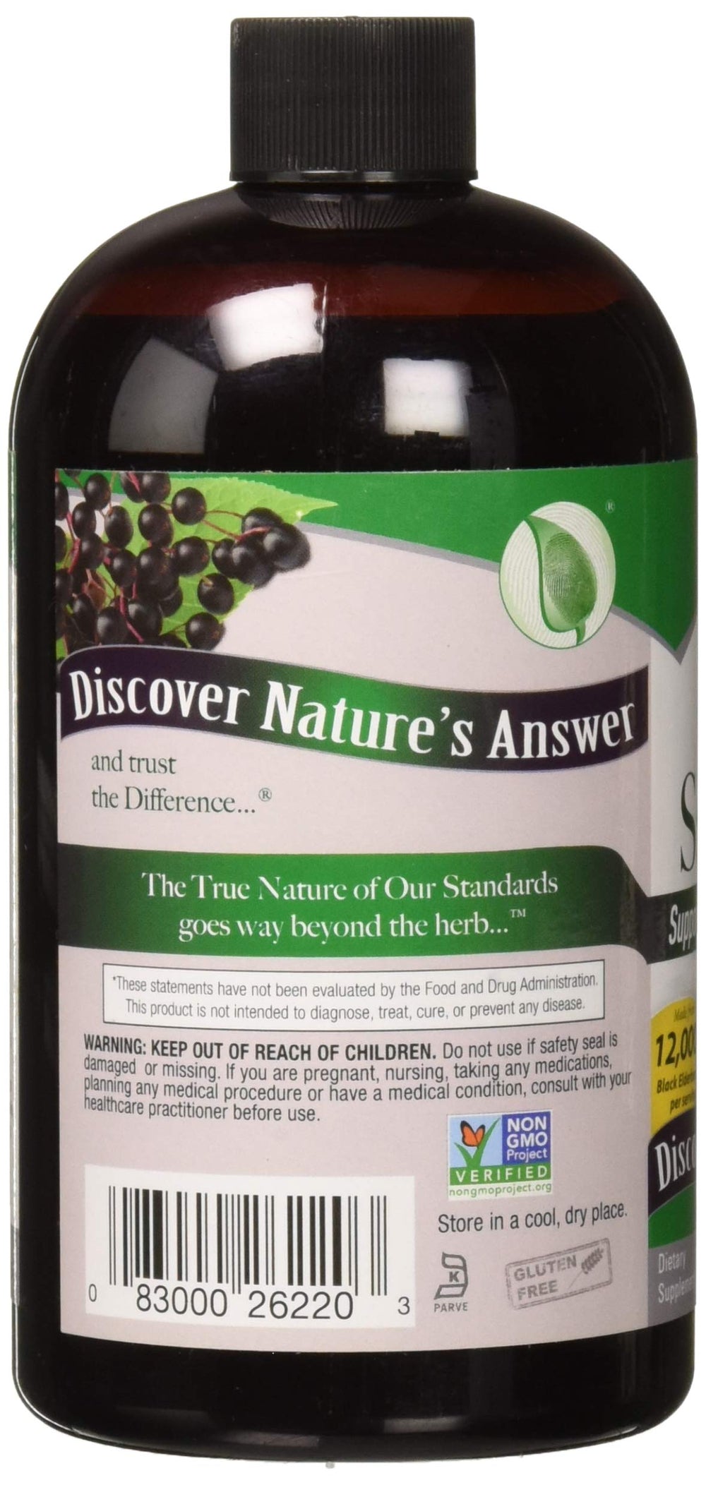 Nature's Answer botella de 16 fl oz junto a objetos para escala