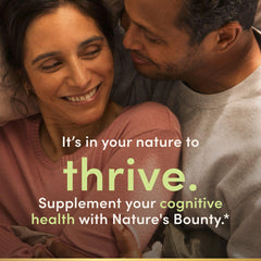 Nature's Bounty Active Mind comparación de tamaño junto a una moneda para escala