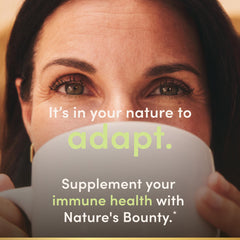 Nature's Bounty cápsulas junto a regla para escala, referencia de tamaño práctico