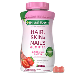 Nature's Bounty frasco frontal mostrando gominolas y beneficio belleza