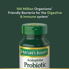 Nature's Bounty tableta en mano mostrando tamaño para dosificación diaria