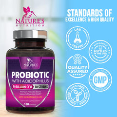 Nature's Nutrition frasco junto a monedas para comparar la escala del producto