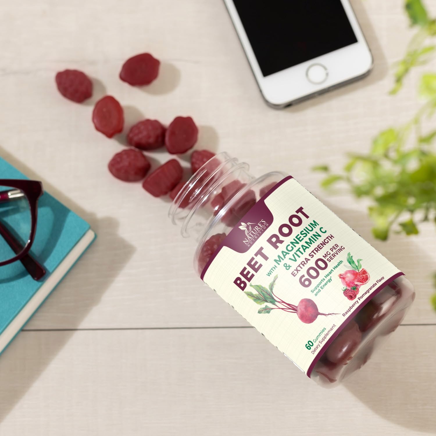 Nature's Nutrition producto en mesa junto a frutas para ambiente de estilo de vida saludable