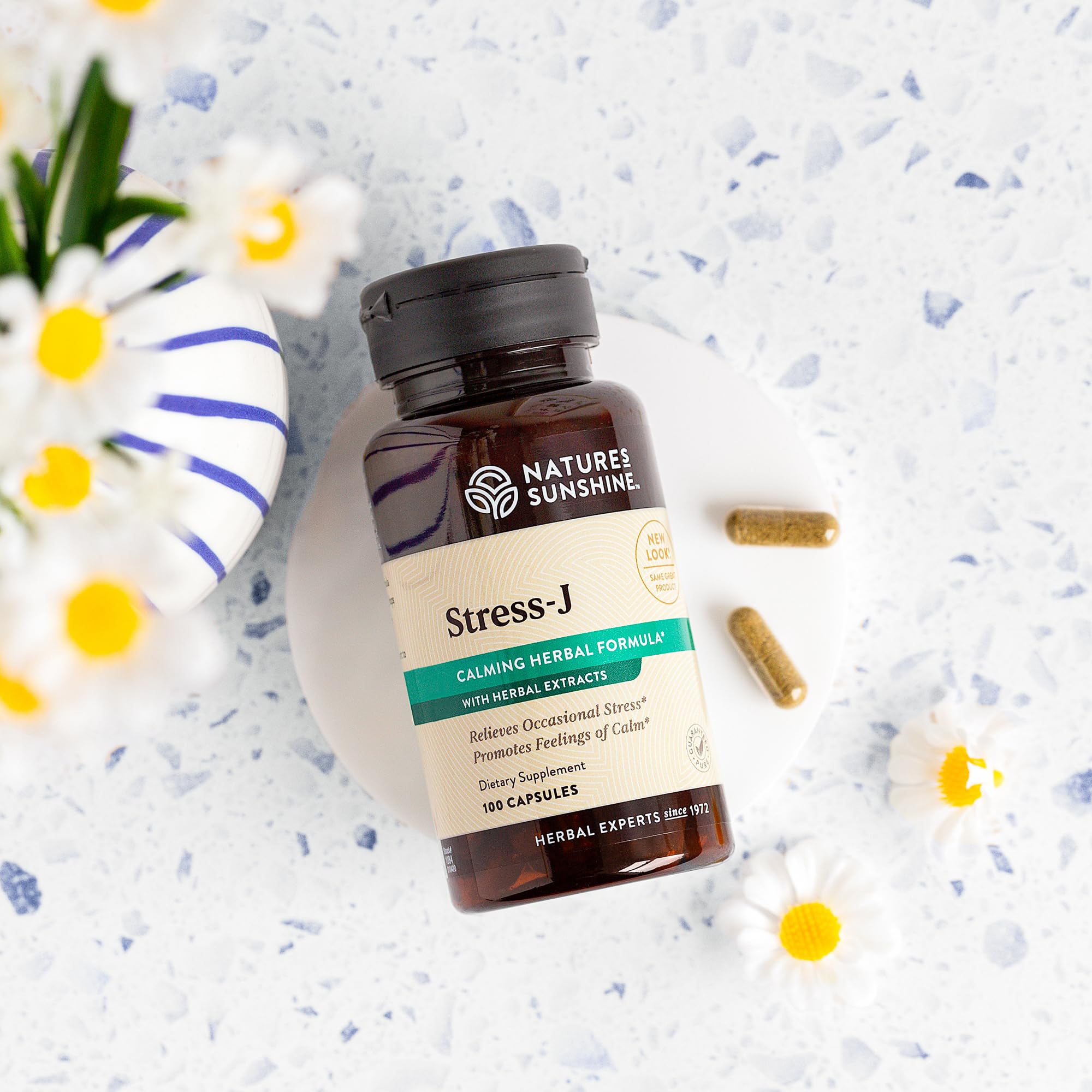 Nature's Sunshine etiqueta Stress-J con sello NSF que garantiza calidad