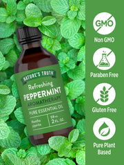 Nature's Truth gotero dejando caer aceite de menta, muestra la textura líquida