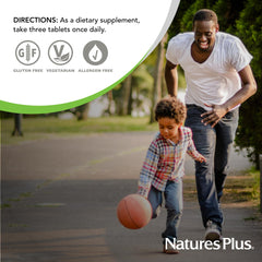 NaturesPlus frasco junto a alimentos en cocina representando uso diario y complemento dietario
