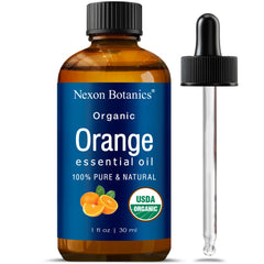 Nexon Botanics frasco delantero del aceite de naranja mostrando etiqueta orgánica y beneficio aromático