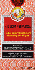 Nin Jiom Pei Pa Koa botella frontal mostrando etiqueta y volumen 300 ml, presenta aspecto natural