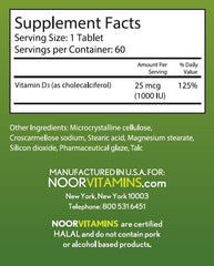 Noor Vitamins tabletas en mano para apreciar tamaño y textura