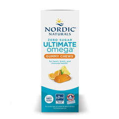 Gomitas Nordic Naturals sobre mesa de cocina transmitiendo uso diario y sabor tropical