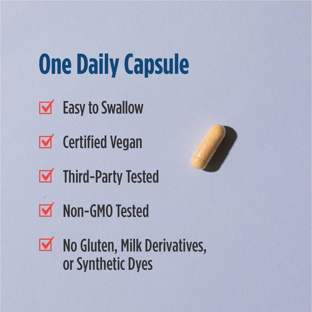 Nordic Naturals cápsula en mano para comparar tamaño y dosificación