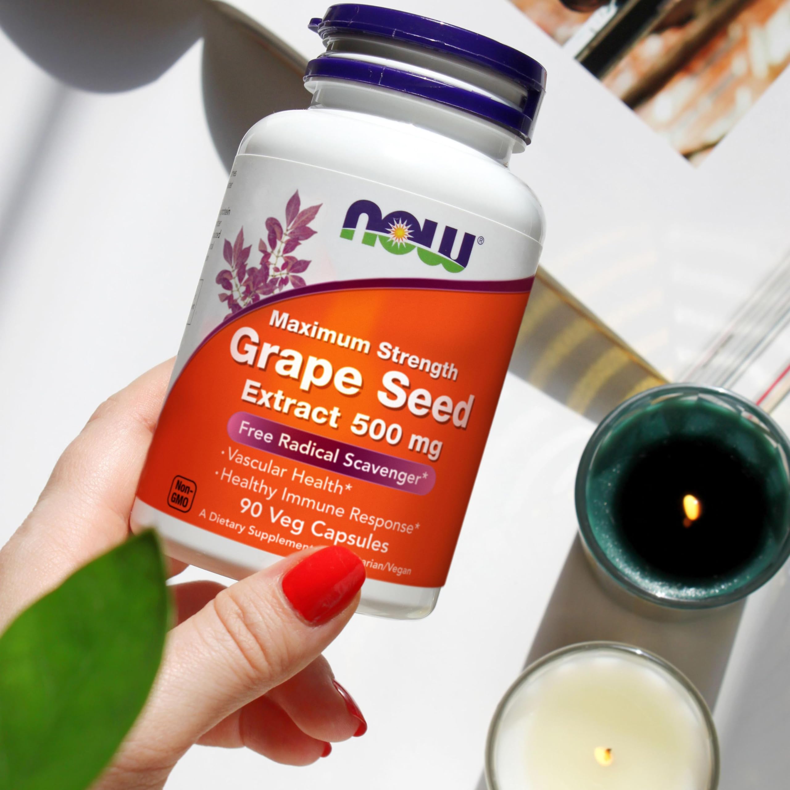 NOW Foods botella en cocina junto a frutas para uso cotidiano saludable